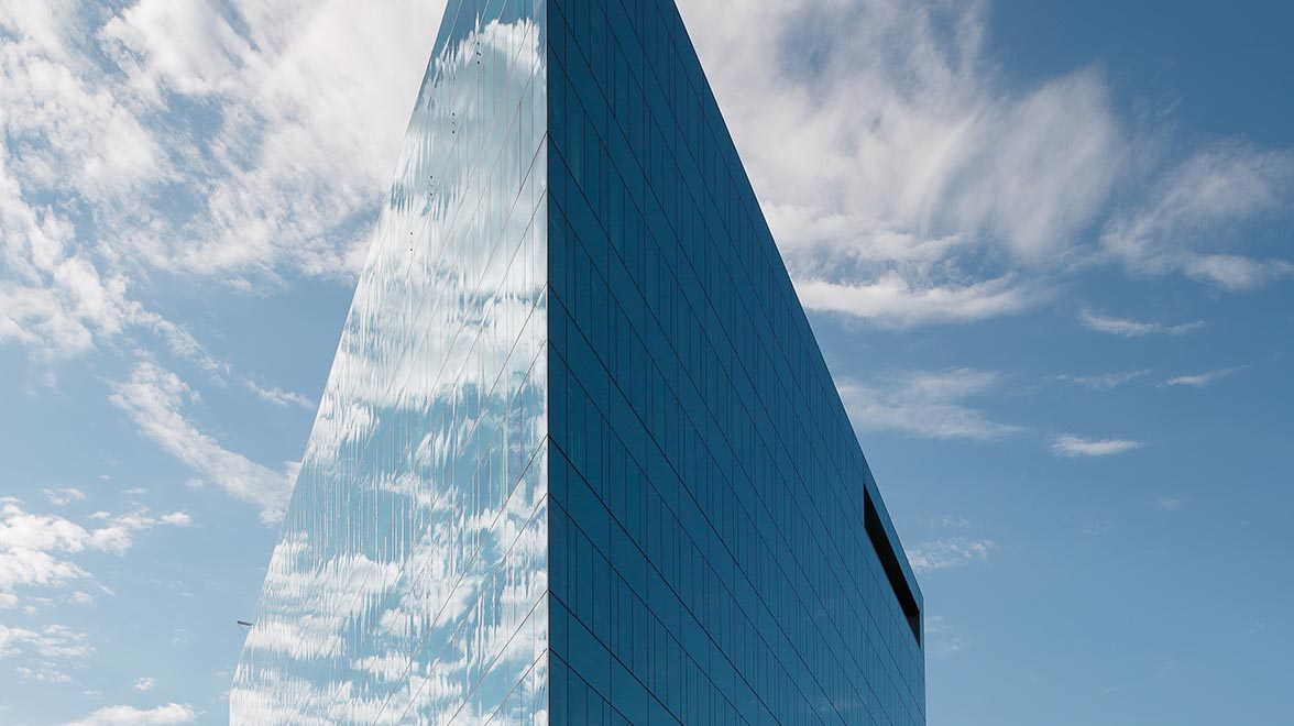 View of the top of The Triangle Building in Denver